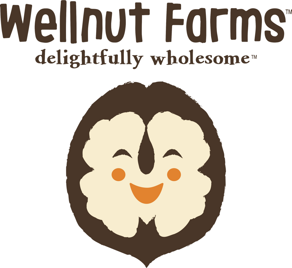 Wellnut Farms logo smiling walnut face